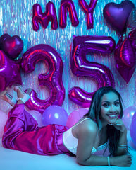 IWERP purple number 9 balloon 40 Inch on stage center, bold focal point for photos.