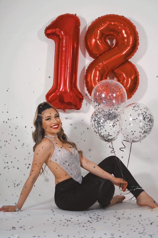 IWERP red 18th birthday balloon 40inch ideal backdrop for photos and celebrations.