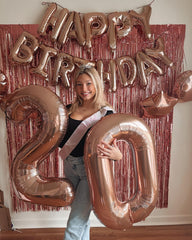 IWERP Rose Gold 10th birthday balloon enhances photos and party ambiance.