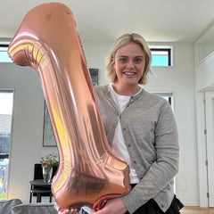 IWERP Rose Gold 19th balloon used as a stylish party prop.