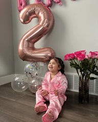 IWERP Rose Gold 2 balloon hanging decoration adds an elegant backdrop