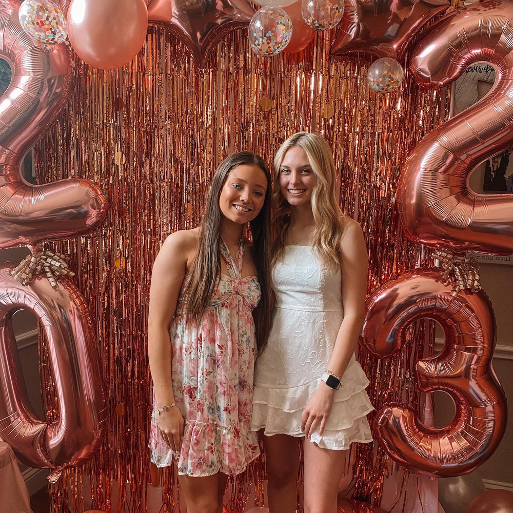 IWERP rose gold celebration backdrop ideal for milestones.