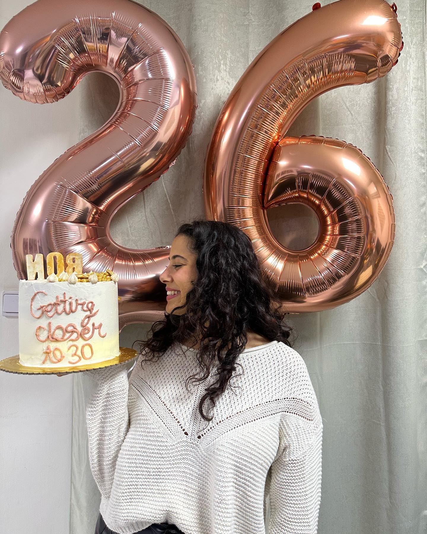 IWERP rose gold birthday balloon creates a focal backdrop for photos.