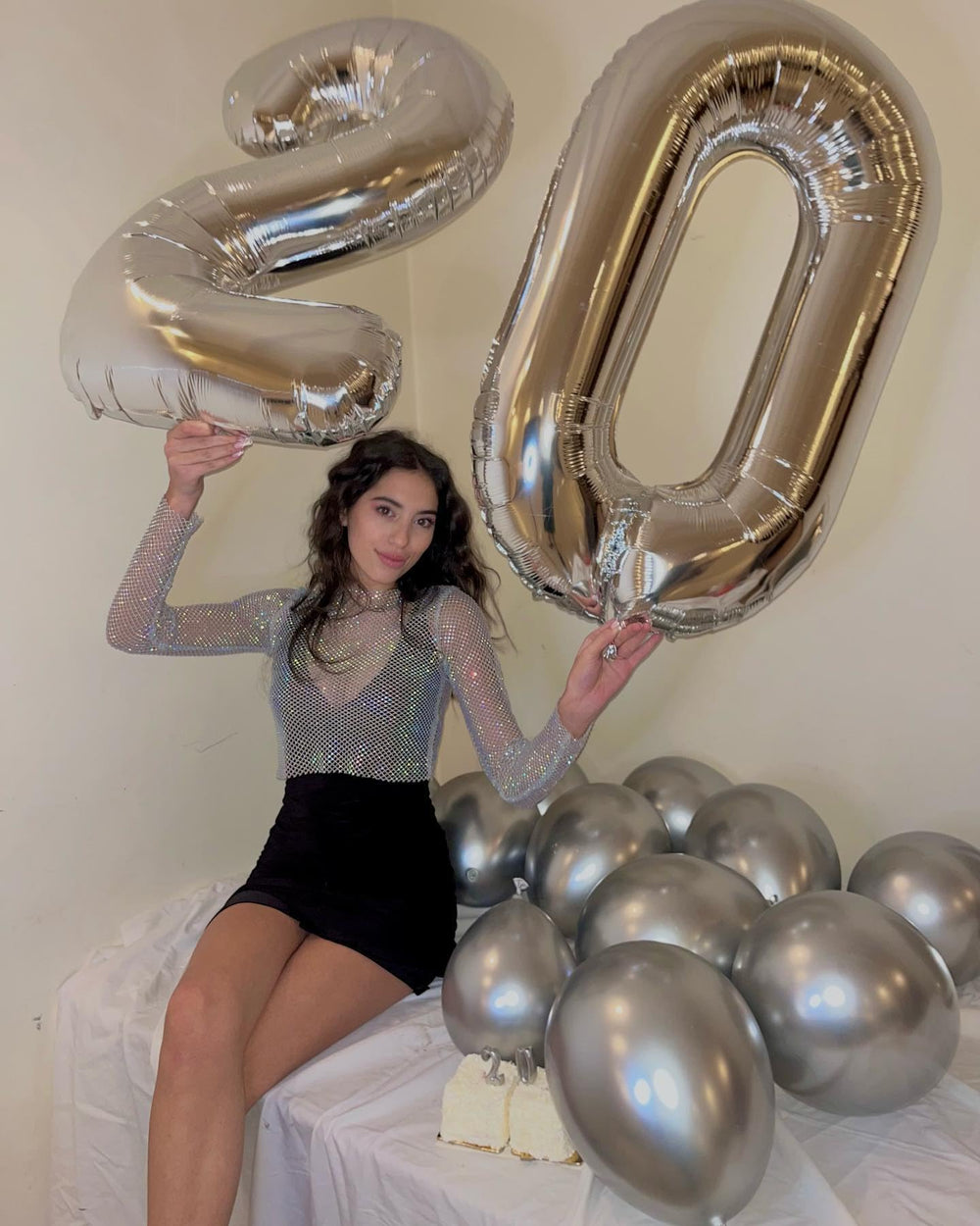 IWERP Silver Number 0 balloon forms an elegant centerpiece with a reflective finish