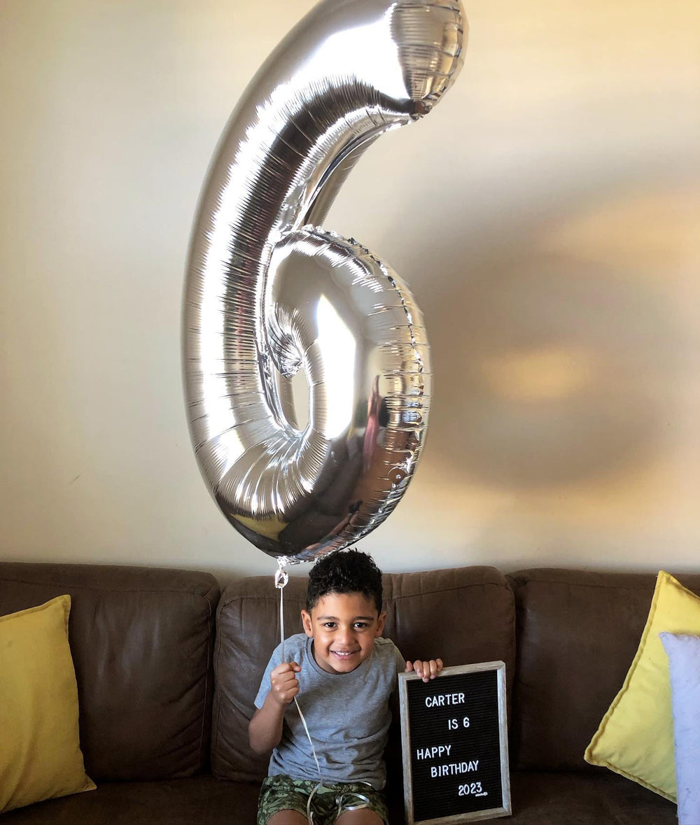 IWERP silver number balloons decorate entrances and stages beautifully.