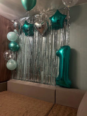 IWERP teal 2nd birthday balloon ready for reuse after the celebration