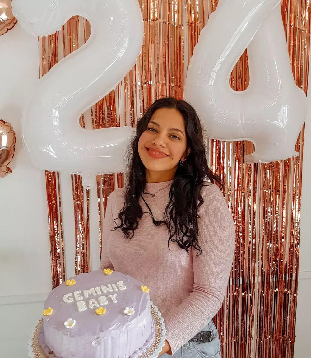 IWERP 40-inch white numeral balloon creates a dramatic stage backdrop or photo area.