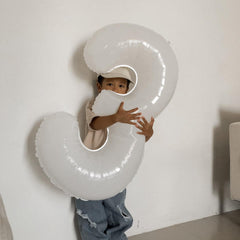IWERP white 5 balloon center-stage decor for visual impact.