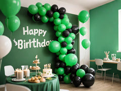 IXVAN green balloons in a coordinated event backdrop for photos