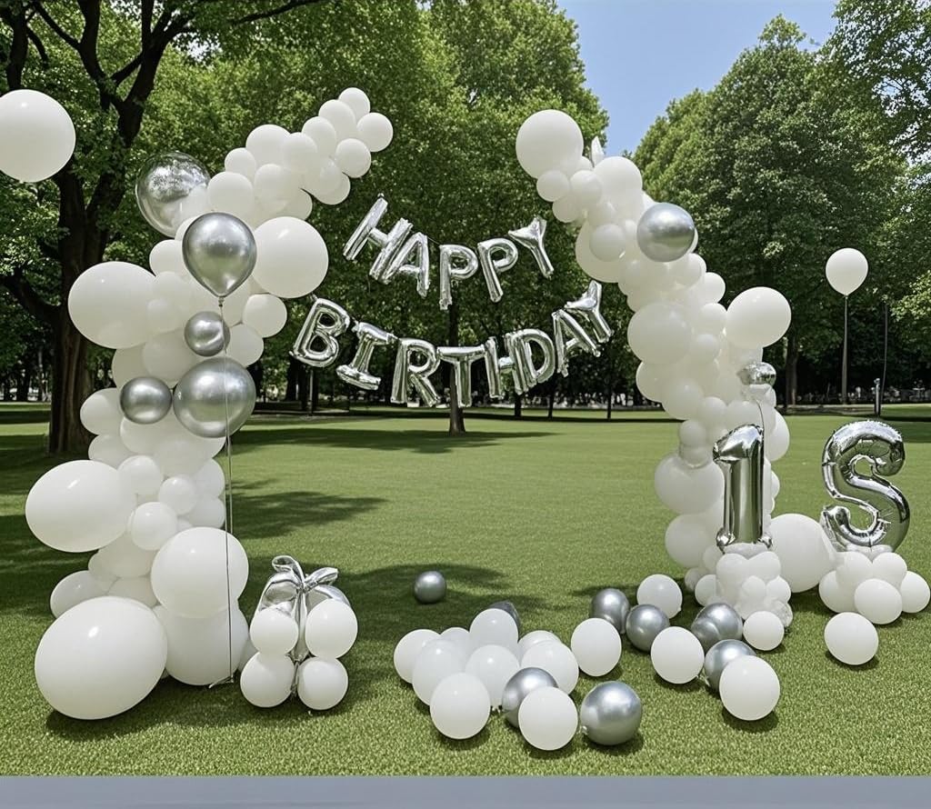 IXVAN white 5-inch balloons adding texture to party clusters.