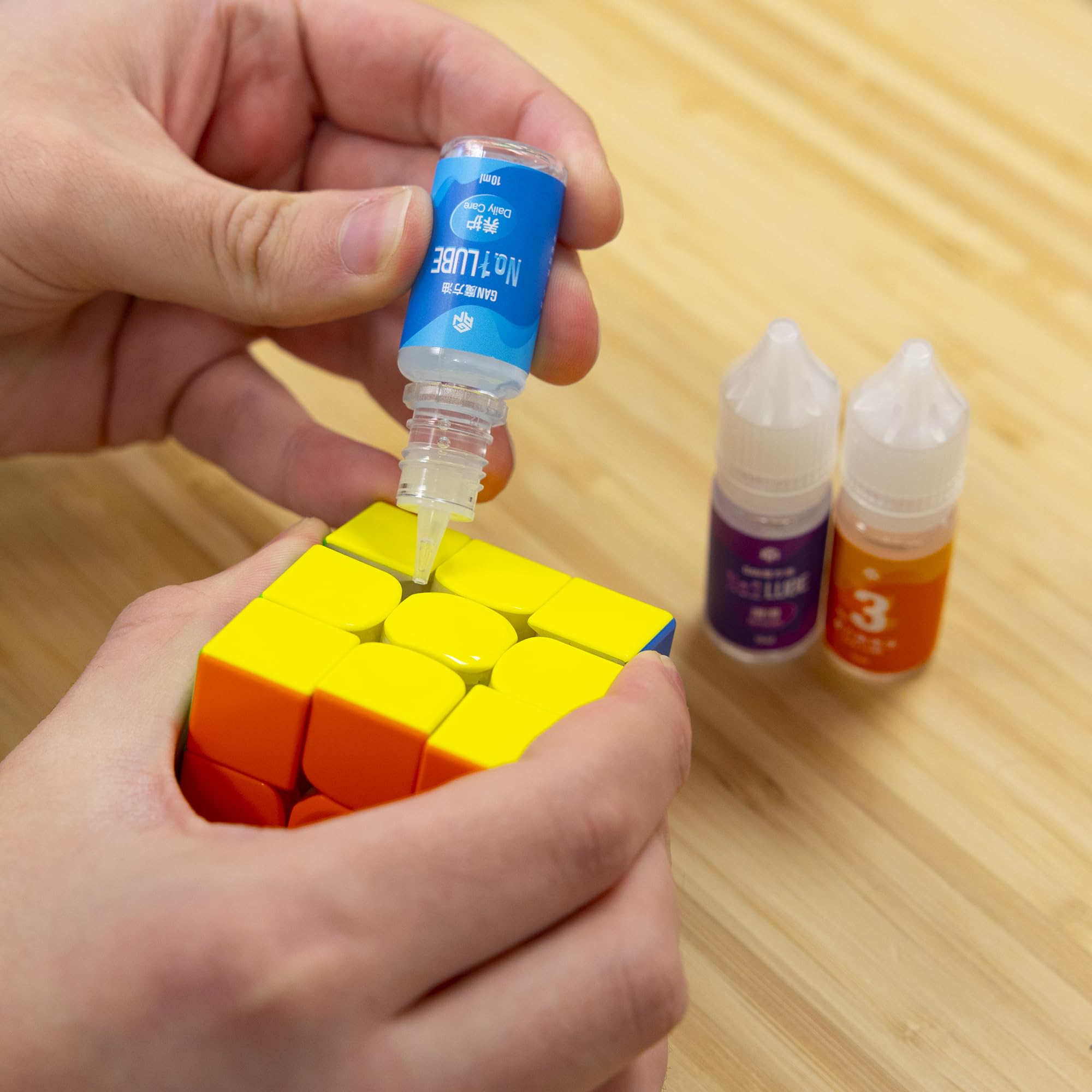 iYallow Speed Cube Lubricant application drop demonstrates precise use for enhanced performance.