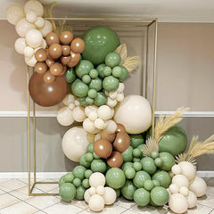 Iyovgoo Sage Green Tan Balloon Arch Kit setup creates a chic baby shower backdrop.