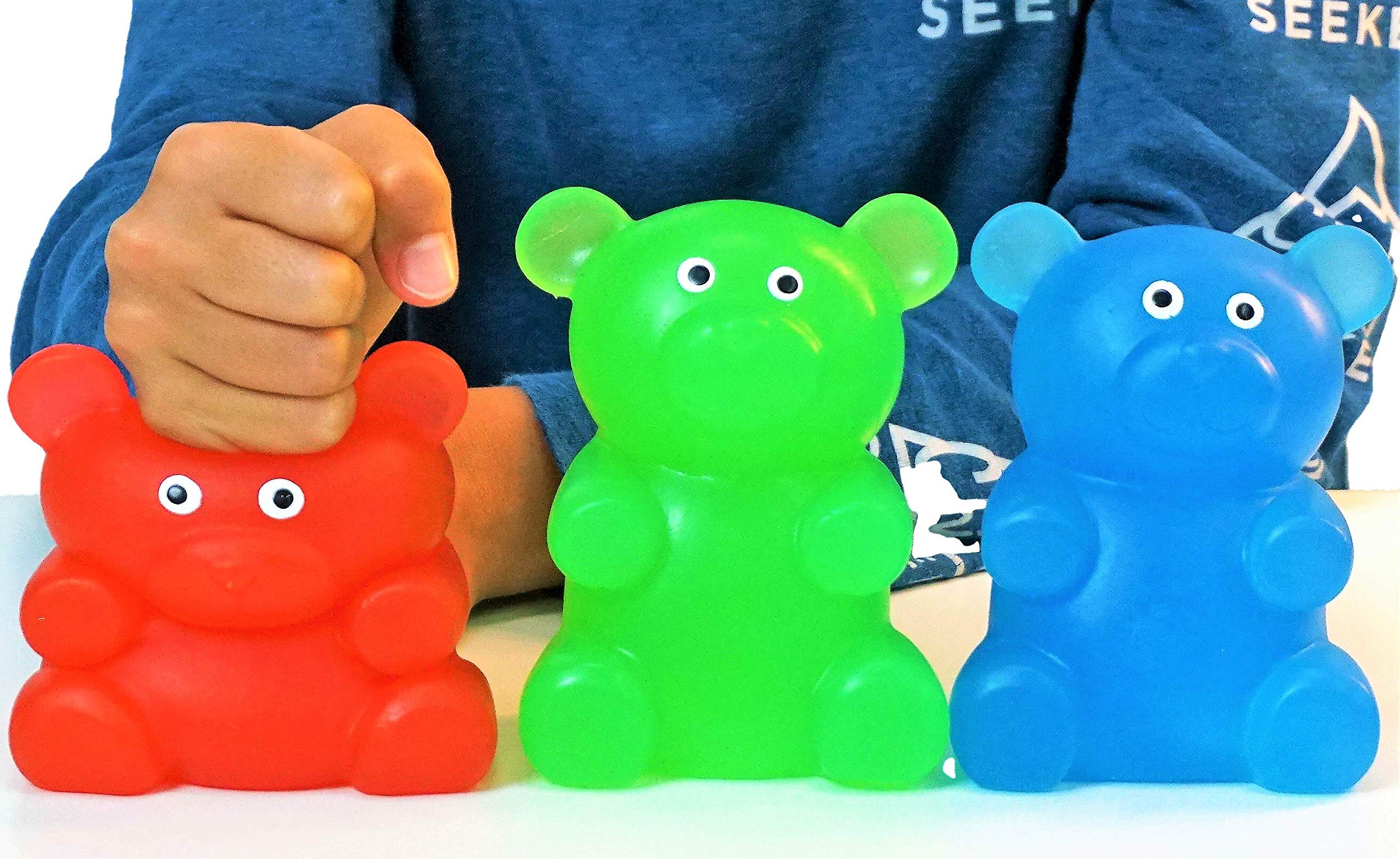 JA-RU gummy bear being squeezed to help focus during tasks.