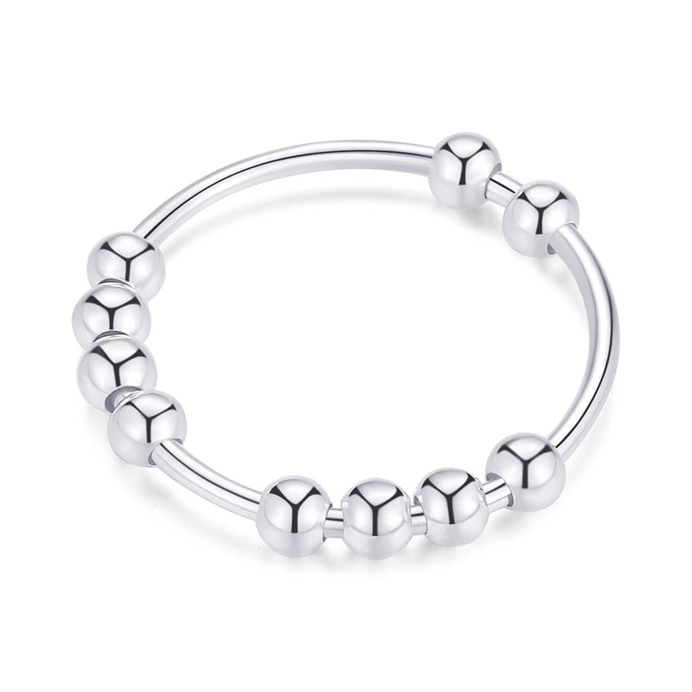 Jacruces 925 silver spinner ring with beads on finger for tactile focus.