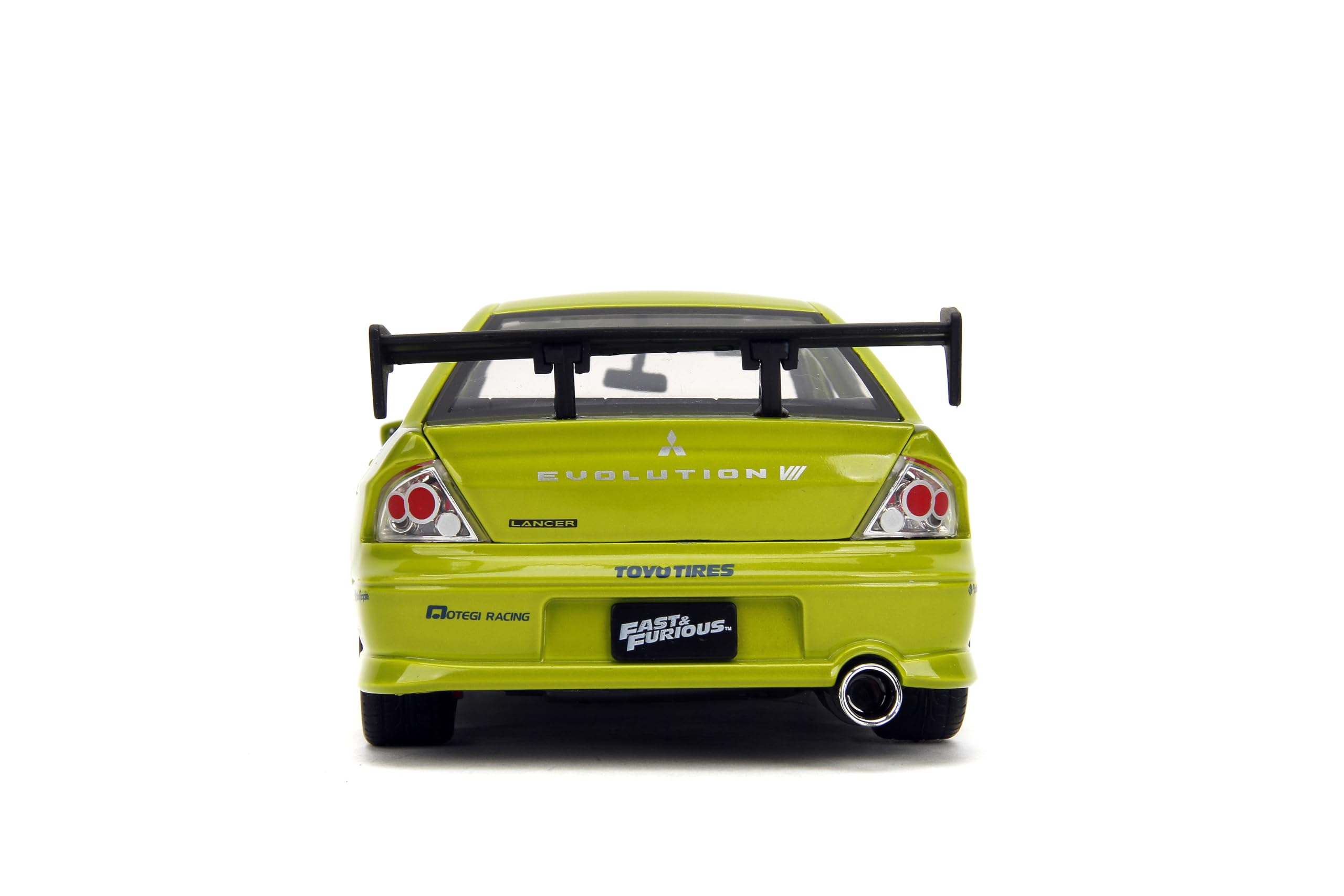 Jada Aero-modifications and performance wheels on Evo VII highlight handling cues.