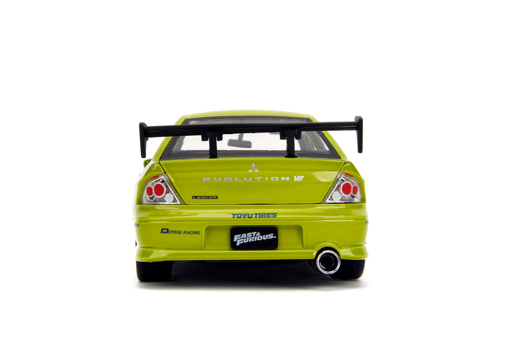 Jada Aero-modifications and performance wheels on Evo VII highlight handling cues.