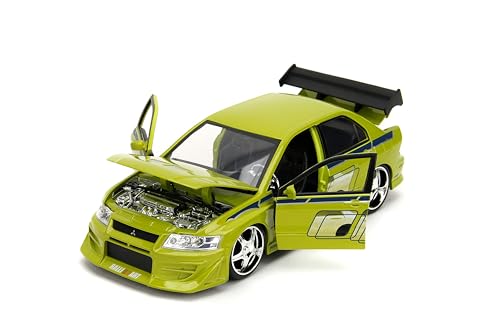 Jada Lime-green Evo VII 1:24-scale model highlighting aero-modifications and wheels.