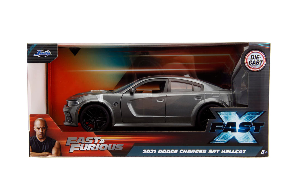 Jada Dom's Charger die-cast with open hood showing engine details for collectors