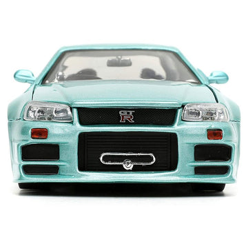 Jada Brian's Skyline GT-R R34 interior detailing enhances realism on display.