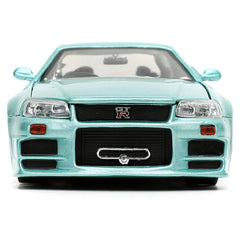 Jada Brian's Skyline GT-R R34 interior detailing enhances realism on display.