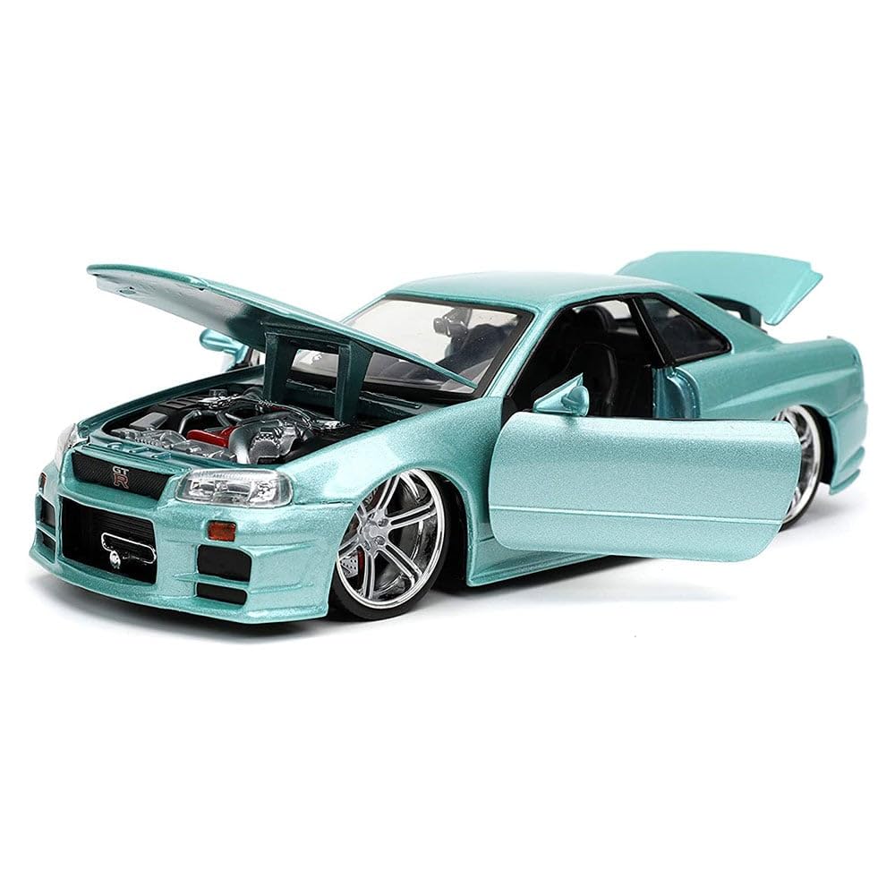 Brian's Skyline GT-R R34 opening hood reveals authentic engine details.