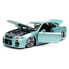 Brian's Skyline GT-R R34 opening hood reveals authentic engine details.