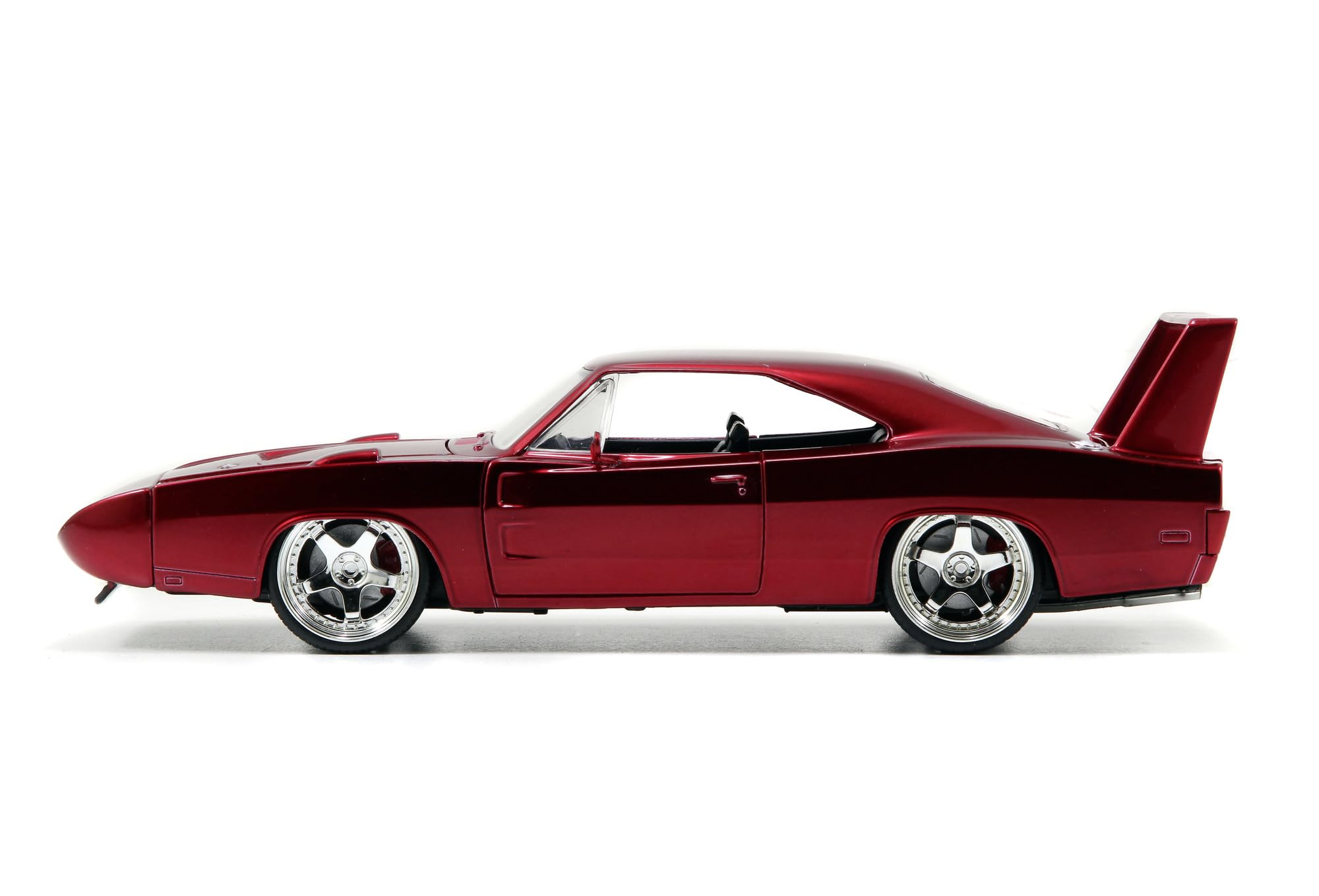 Jada Dom's Charger 1:24 open hood shows authentic mechanical cues from the film