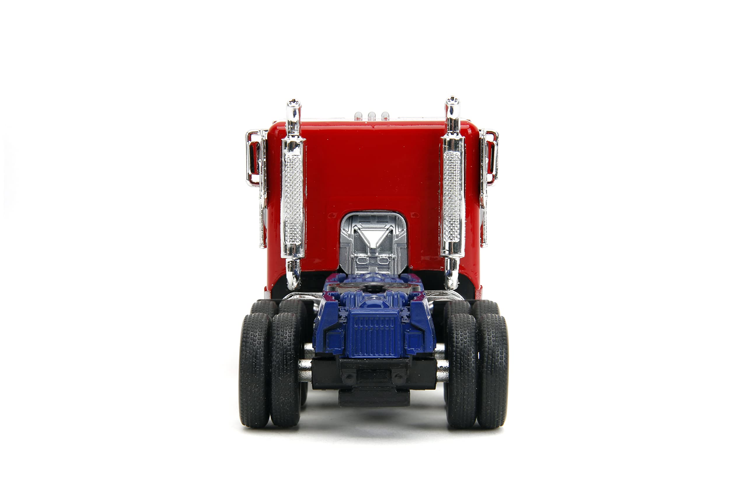 Jada Optimus Prime die-cast robot on chassis for dynamic display.