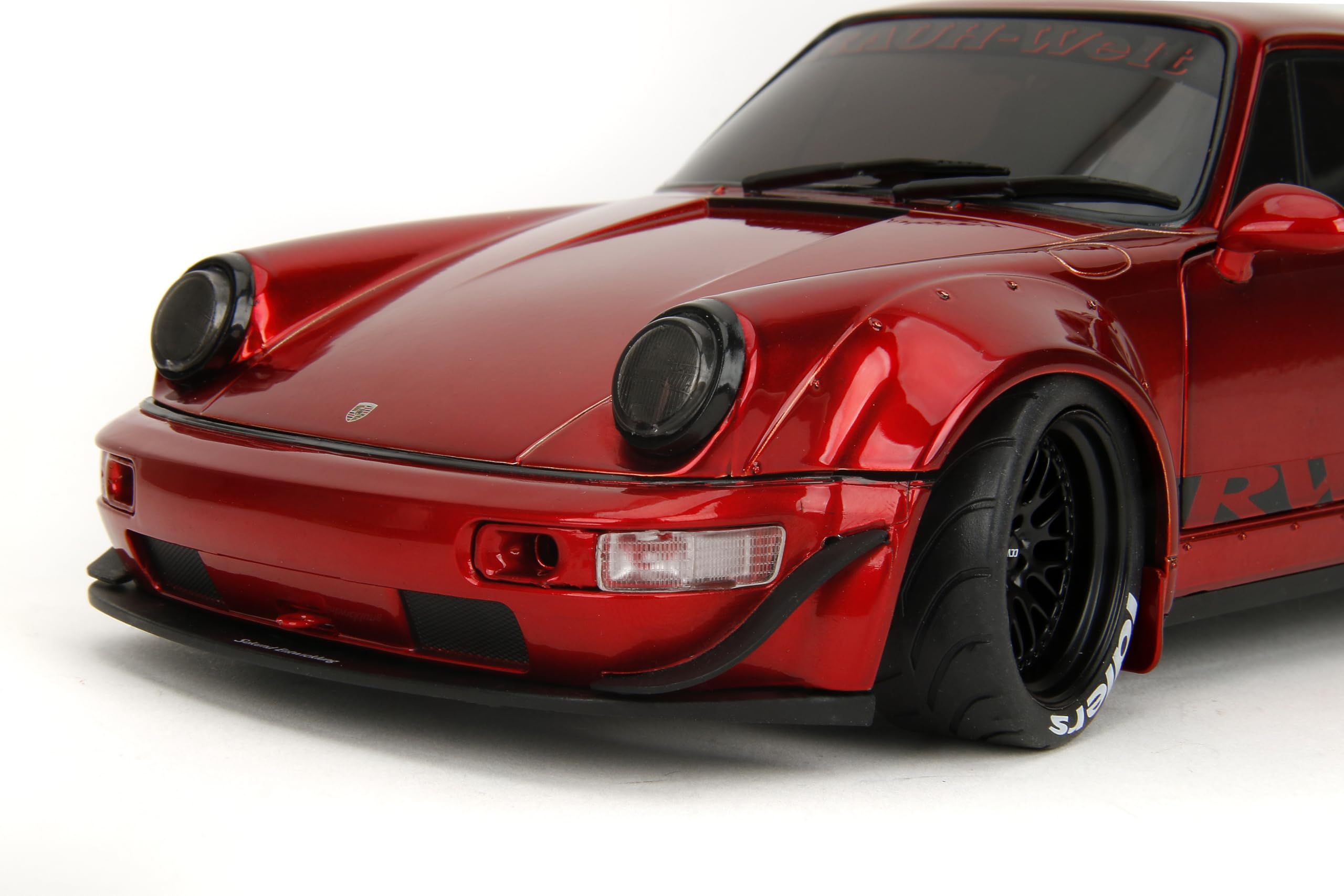 Jada Pink Slips Porsche RWB 964 interior detail emphasizes scale-accurate cabin accents.