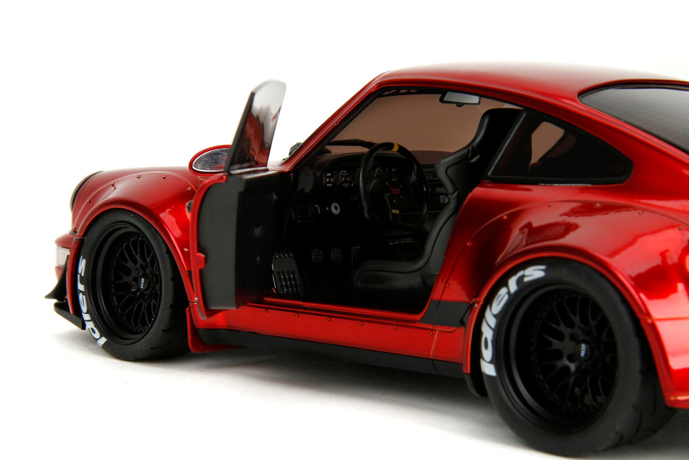 Jada Pink Slips Porsche RWB 964 wheel detail enhances realism with rubber tires.