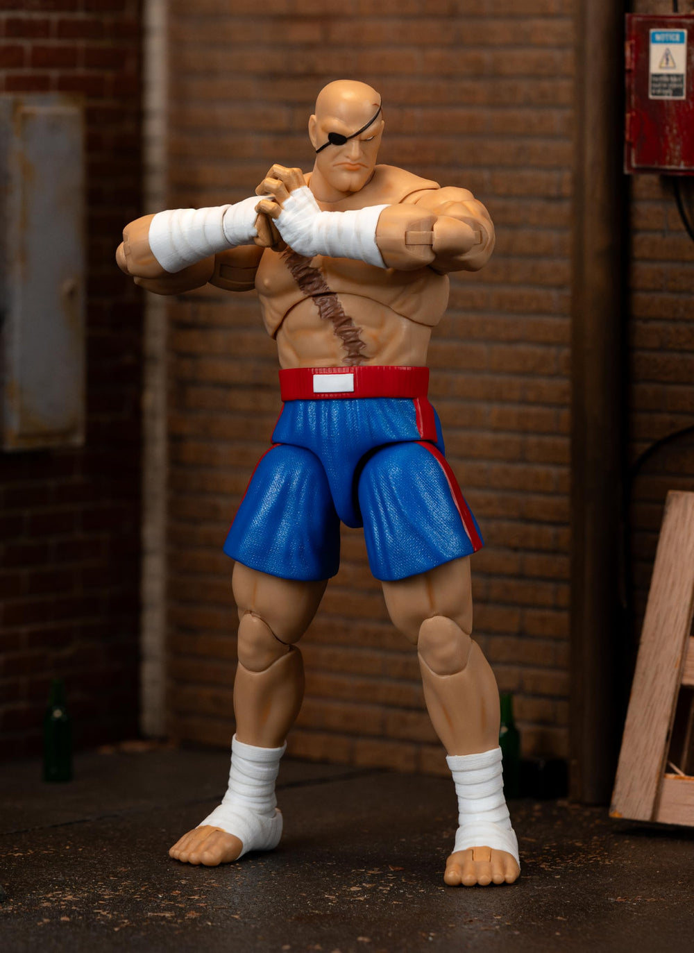 Jada Sagat deluxe Tiger Knee pose for dramatic mid-action display