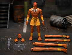 Jada Street Fighter 6 Dhalsim arcade packaging with retro vibe.