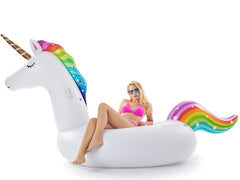 Two adults enjoying Jasonwell unicorn float in a sunny pool