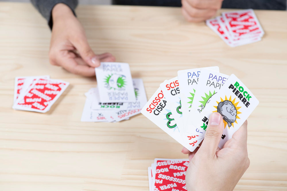 Vibrant artwork on JAX cards enhances family play sessions.