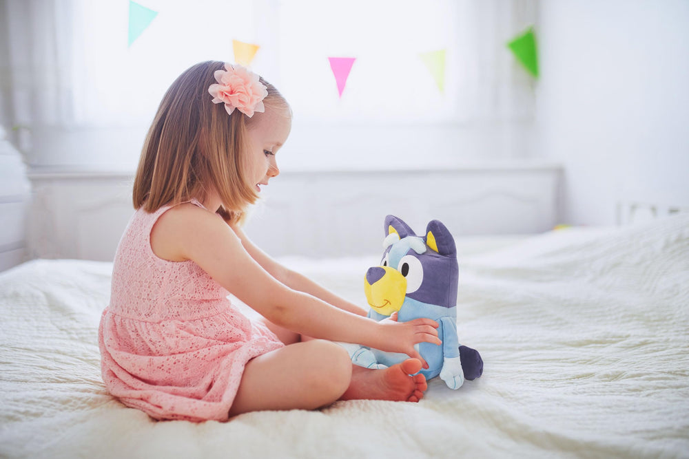 Bluey Pillow Buddy in car rides for on-the-go comfort and distraction.