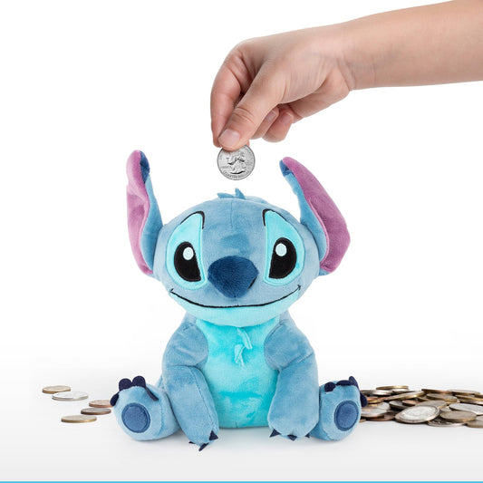 Jay Franco Disney Lilo and Stitch plush coin bank on desk, kid-friendly savings companion.