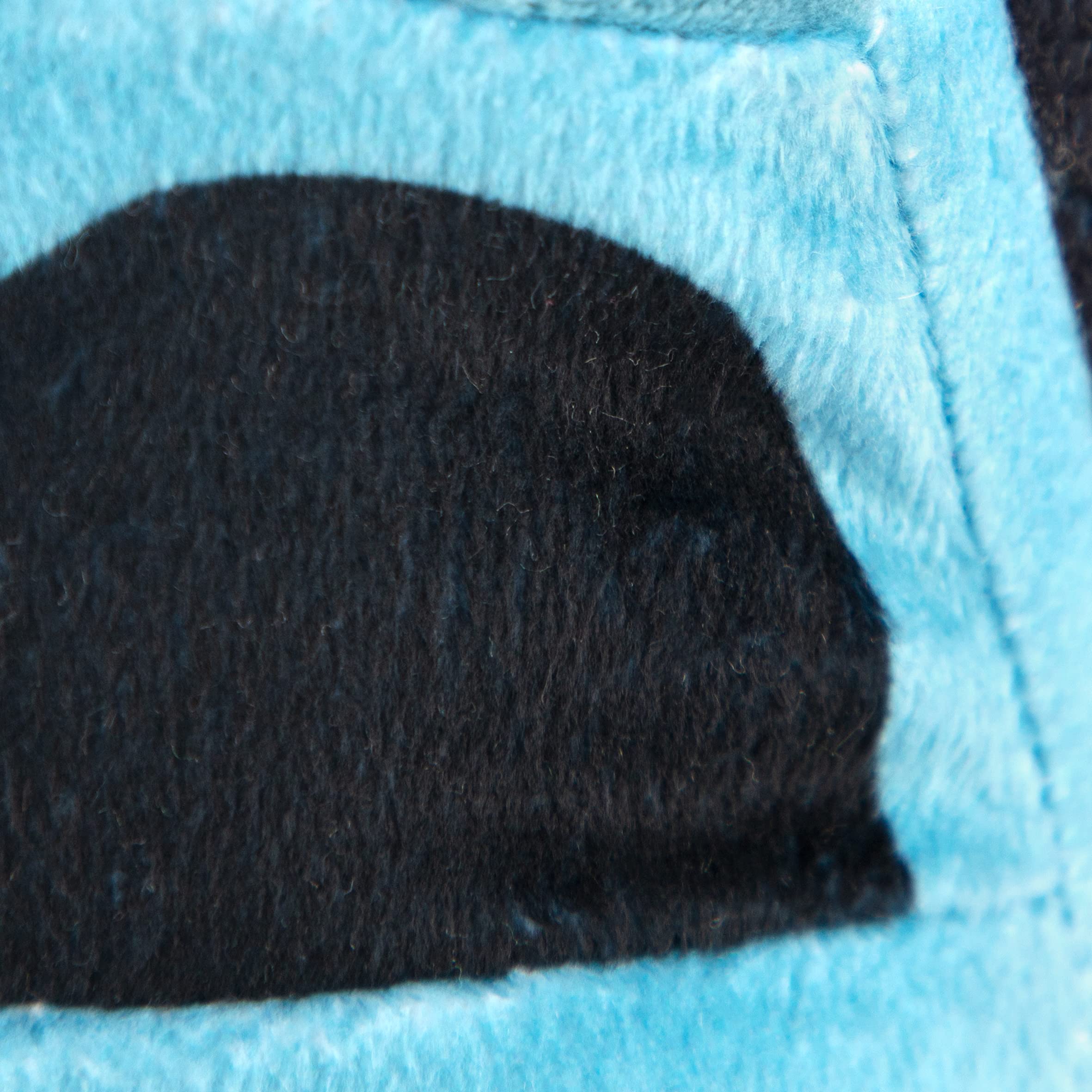 Jay Franco Megalodon pillow buddy resting on bed for cozy nights