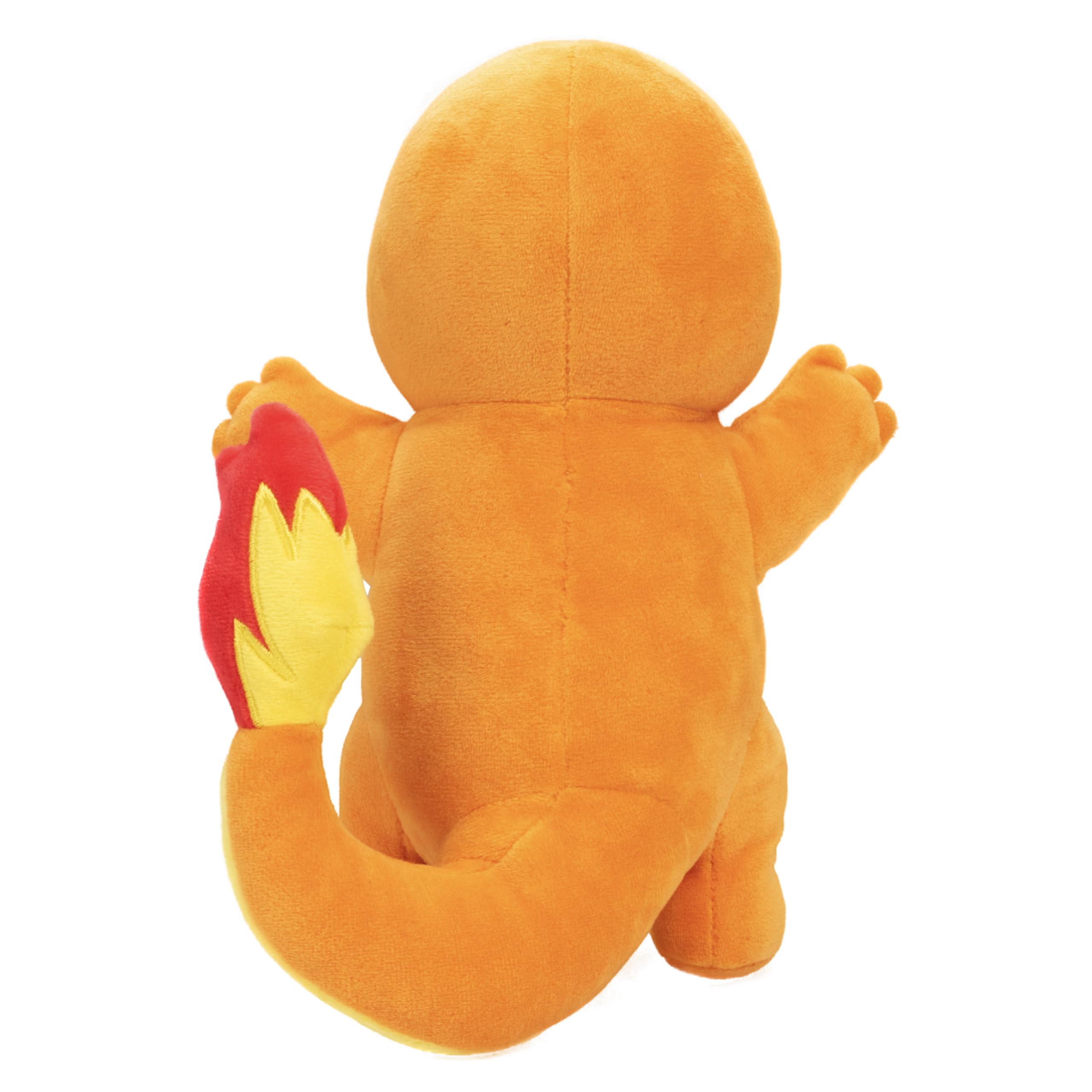 Jazwares Pokémon Charmander plush holding child, ideal Easter basket stuffer.