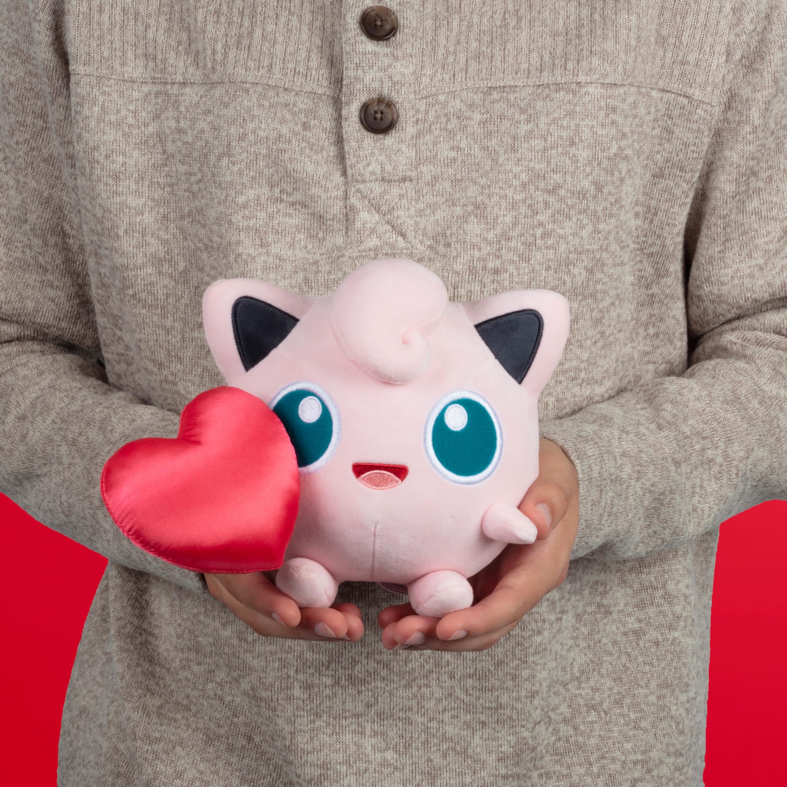 Jazwares Pokemon Jigglypuff plush with heart accessory for gift-ready moments.