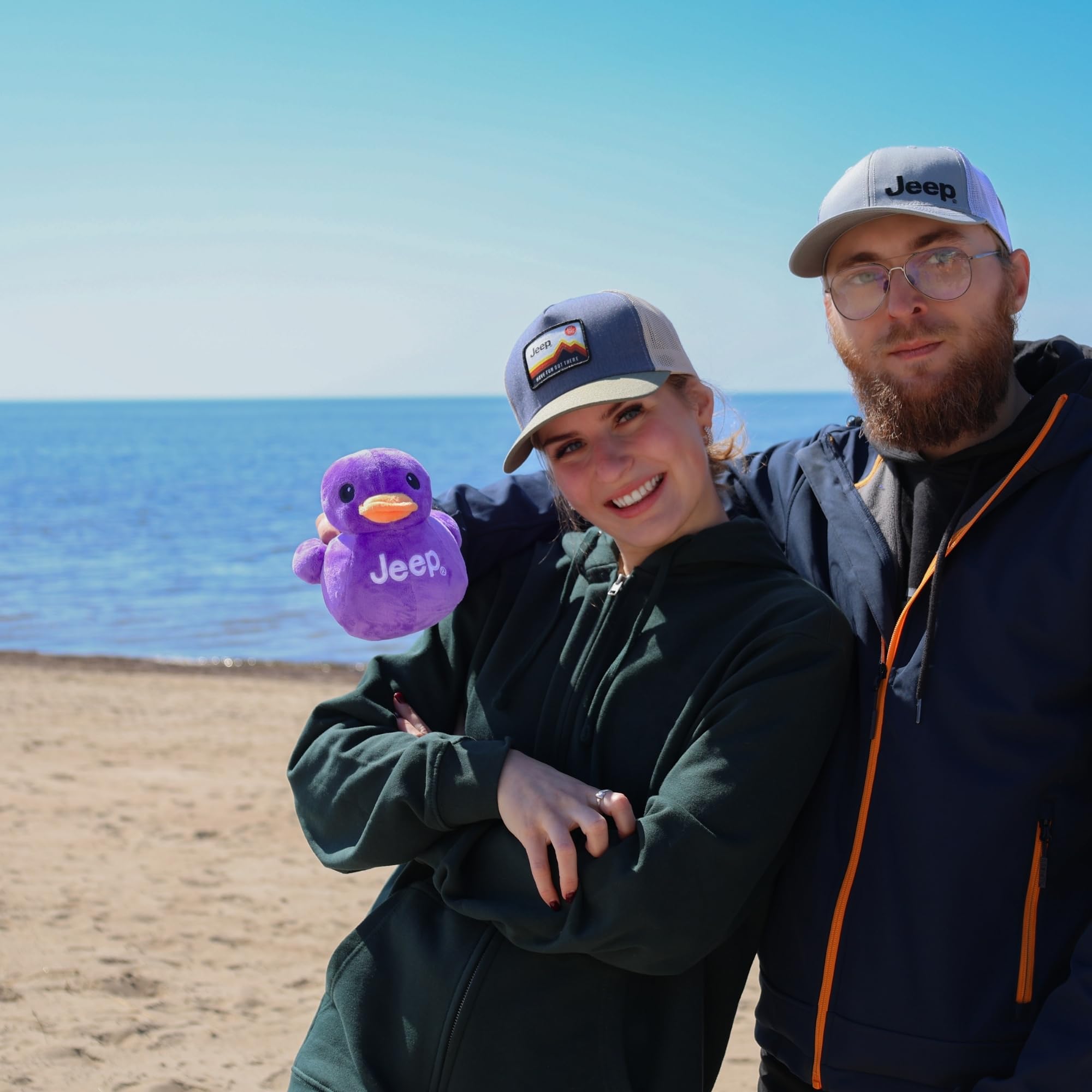Close-up of Jeep Text Logo plush duck reveals soft fabric and rich purple color.