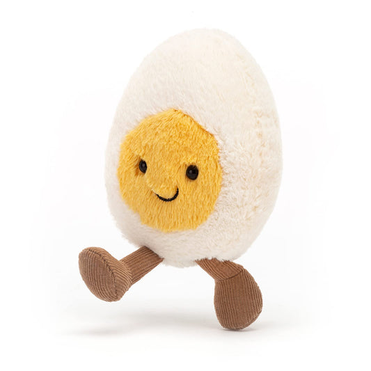 Jellycat Amuseables Boiled Egg Happy plush features a bright yellow yolk.