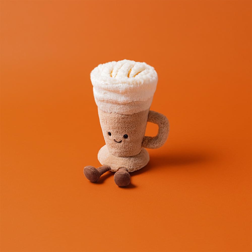 Jellycat Amuseables Latte closeup knit-fabric shows soft, inviting texture.