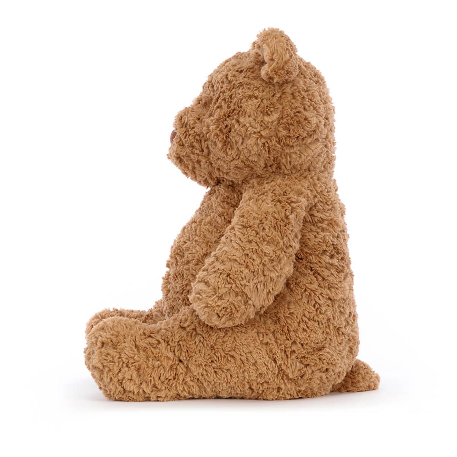 Jellycat Bartholomew Bear side view highlights squishy tummy and hug-ready shape.