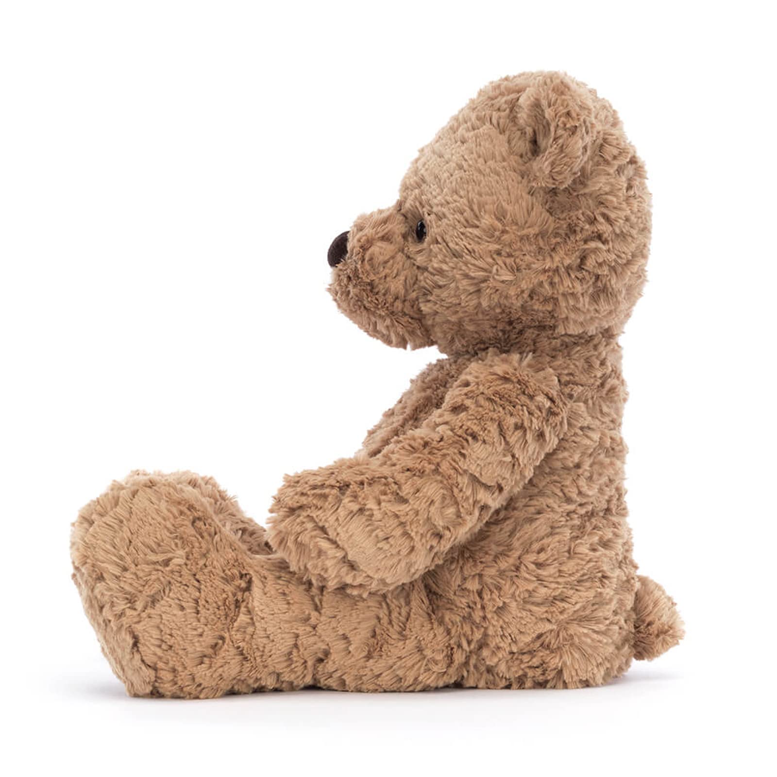 Jellycat Bumbly Bear held by a child demonstrates a perfect bedtime companion