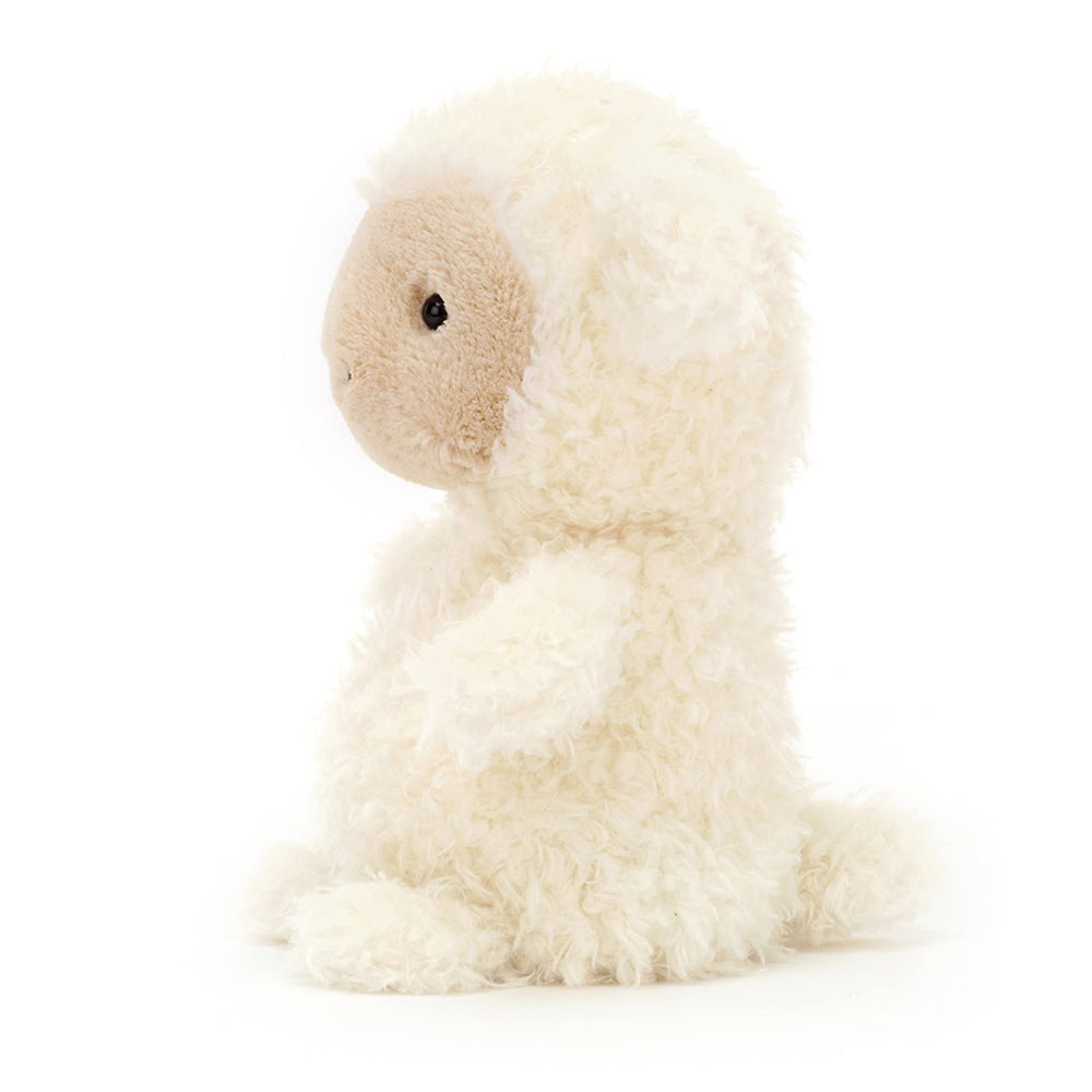 Jellycat Little Lamb face closeup shows soft peach-fuzz expression.
