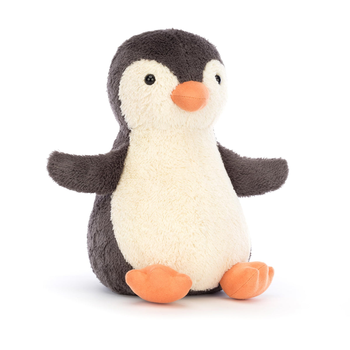 Jellycat Peanut Penguin plush sits upright for cozy cuddles.