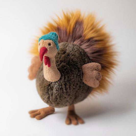 Jellycat Theo Turkey features wings and expressive face for imaginative play.