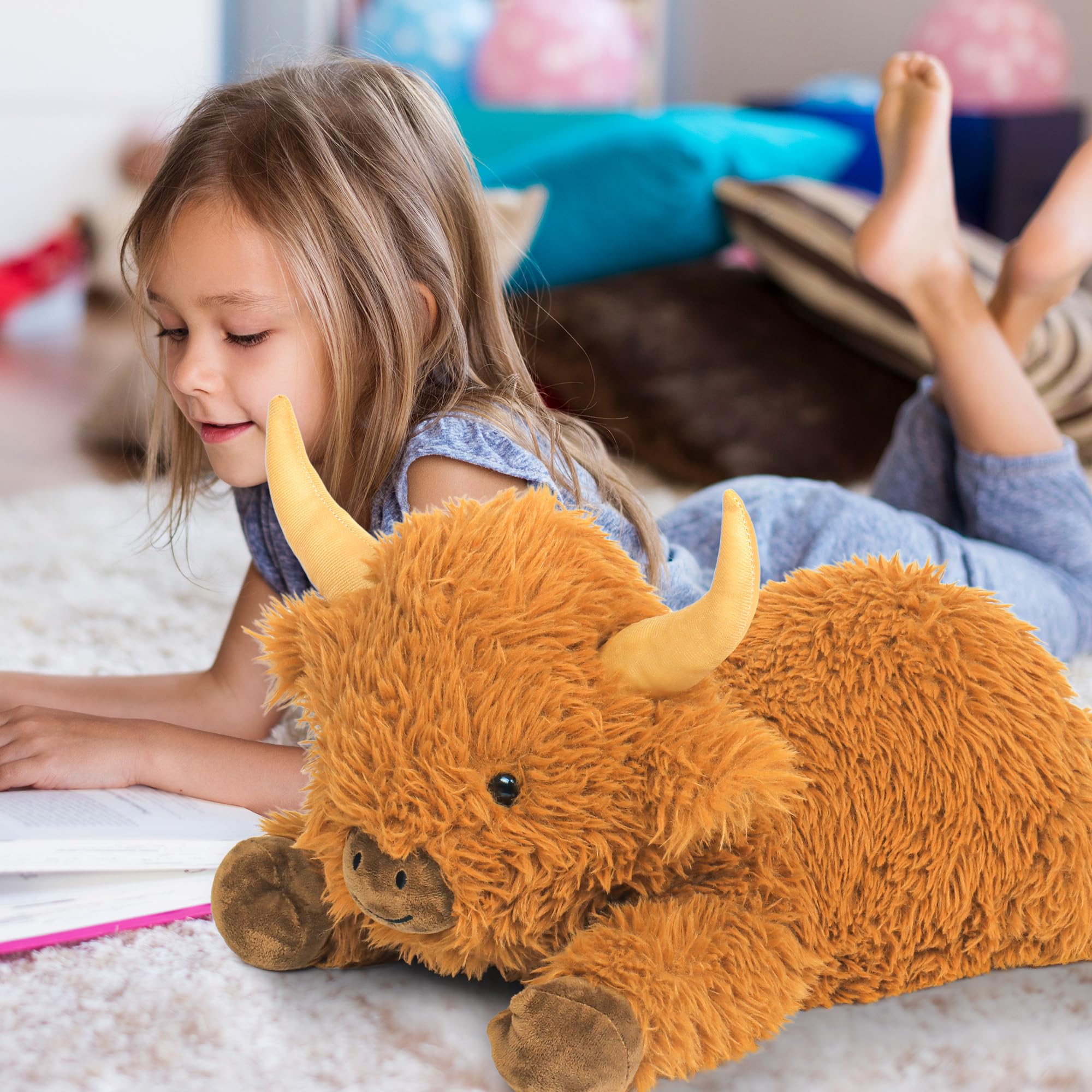Close-up of weighted beads inside JellyMallow Highland Cow plush for soothing touch.
