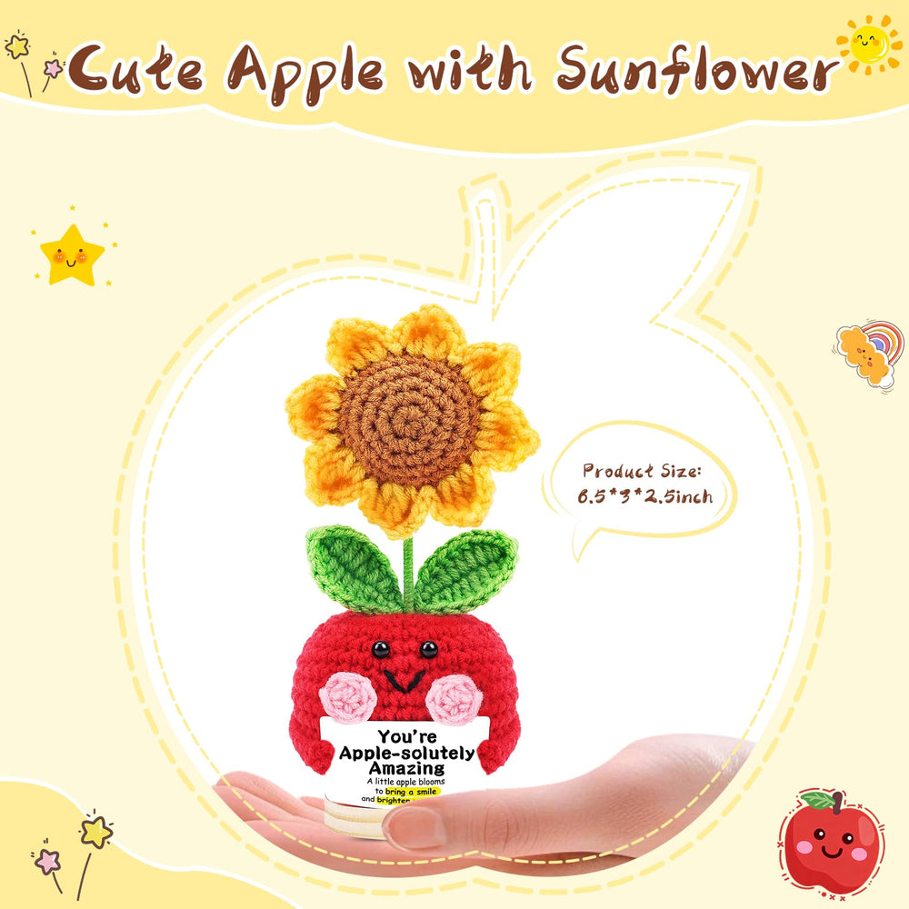JELUTAR crochet apple with sunflower sits on a desk to inspire optimism