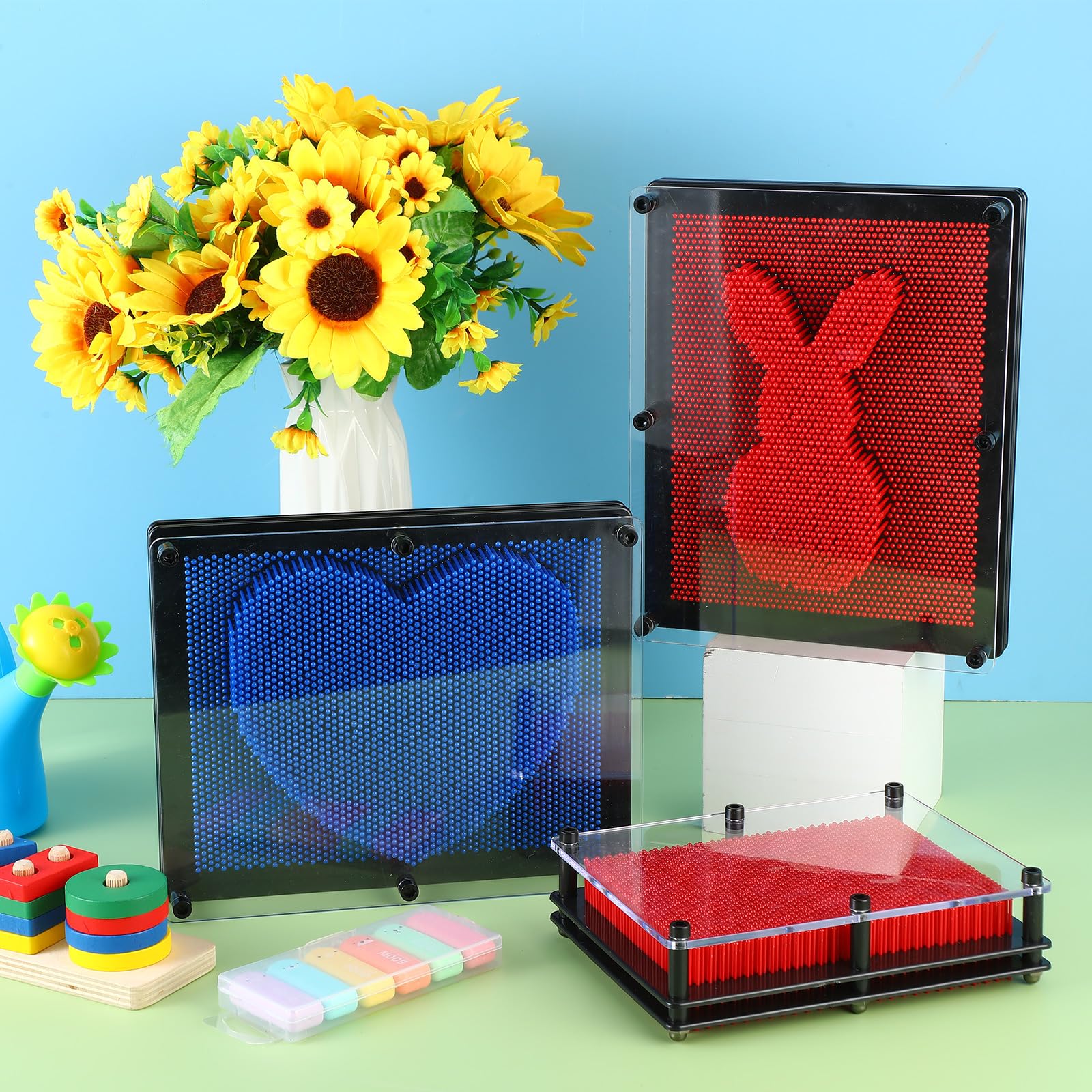 Jenaai desk decor pin art board, red and blue colors add vibrancy.